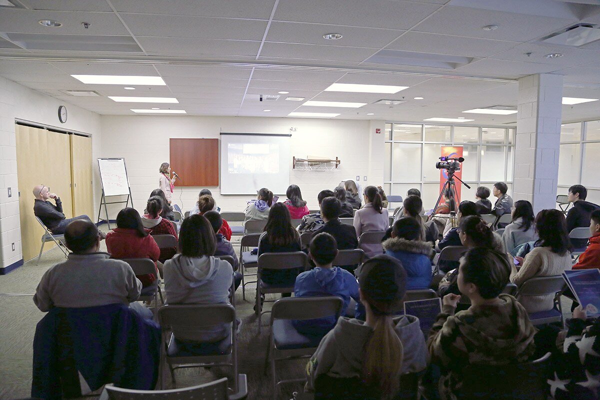 Community members attending a technology learning session